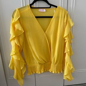 Pink lily yellow lightweight top. Size small Never worn, brand new without tags.